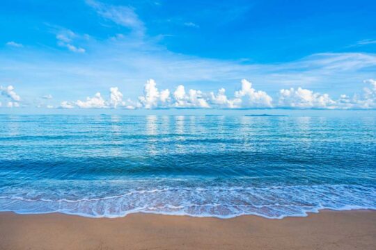 guam-beautiful-tropical-beach-sea-ocean-with-white-cloud-blue-sky-copyspace
