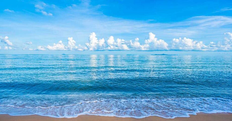 guam-beautiful-tropical-beach-sea-ocean-with-white-cloud-blue-sky-copyspace